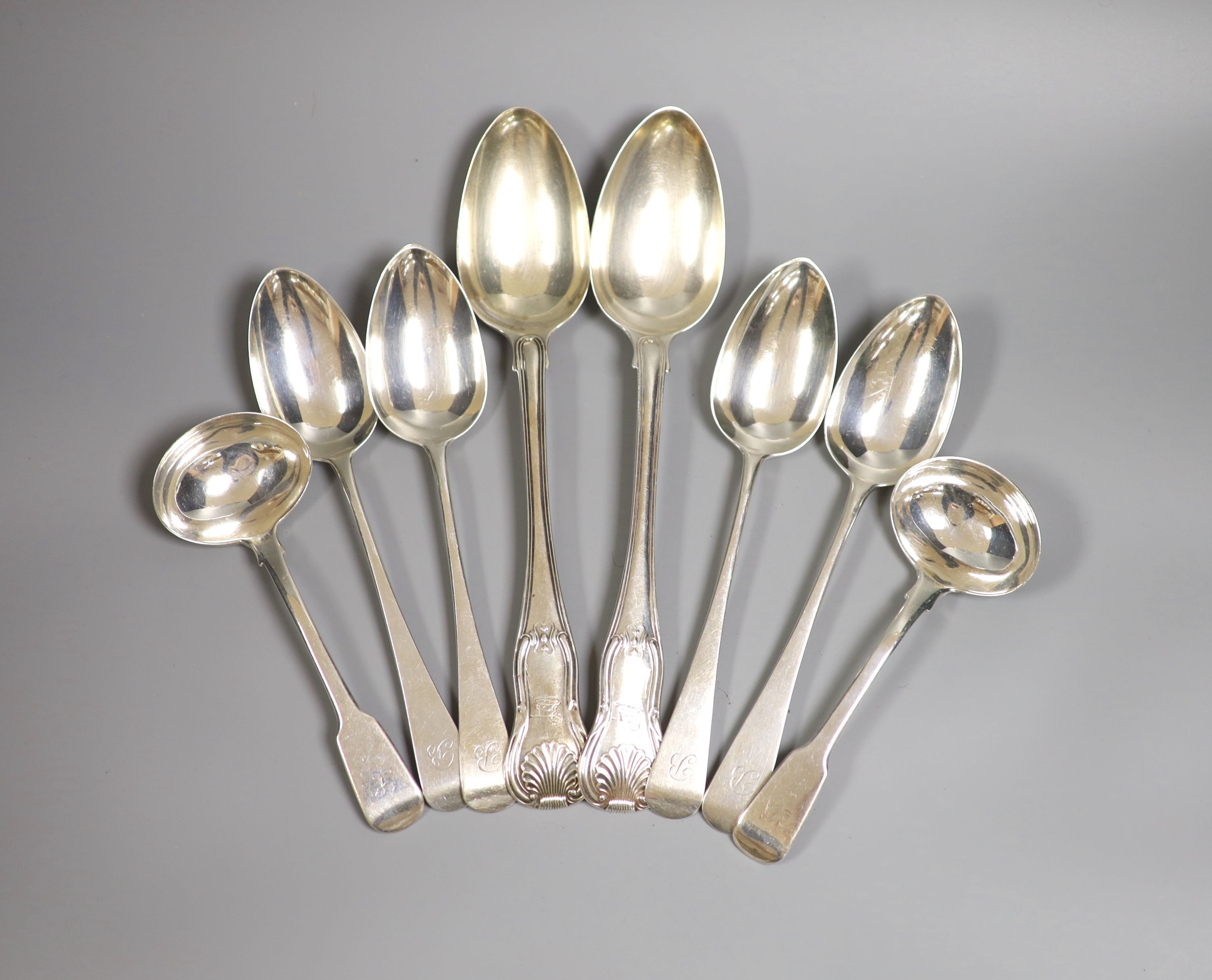 A pair of George III silver hourglass pattern basting spoons, London, 1812, a pair of silver sauce ladles and four Victorian silver tablespoons, 22.5oz.